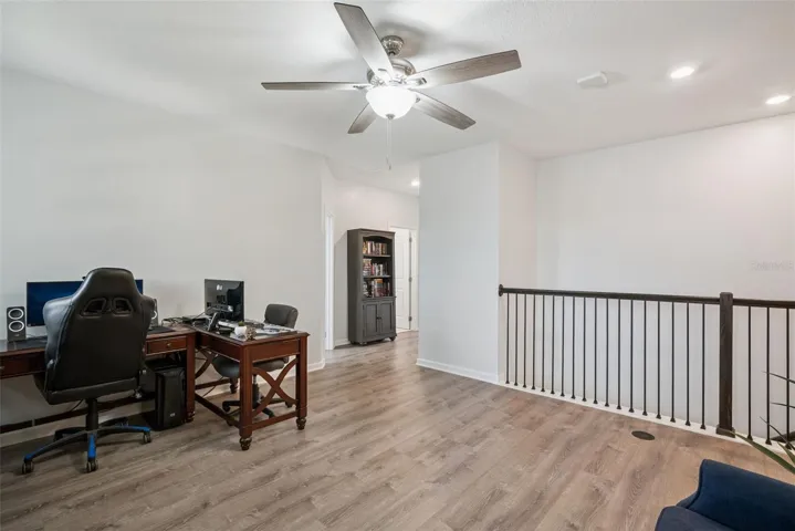 Upstairs bonus room with open railing