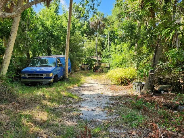 Owner plans to remove van.  View from gate at Ginger Rd
