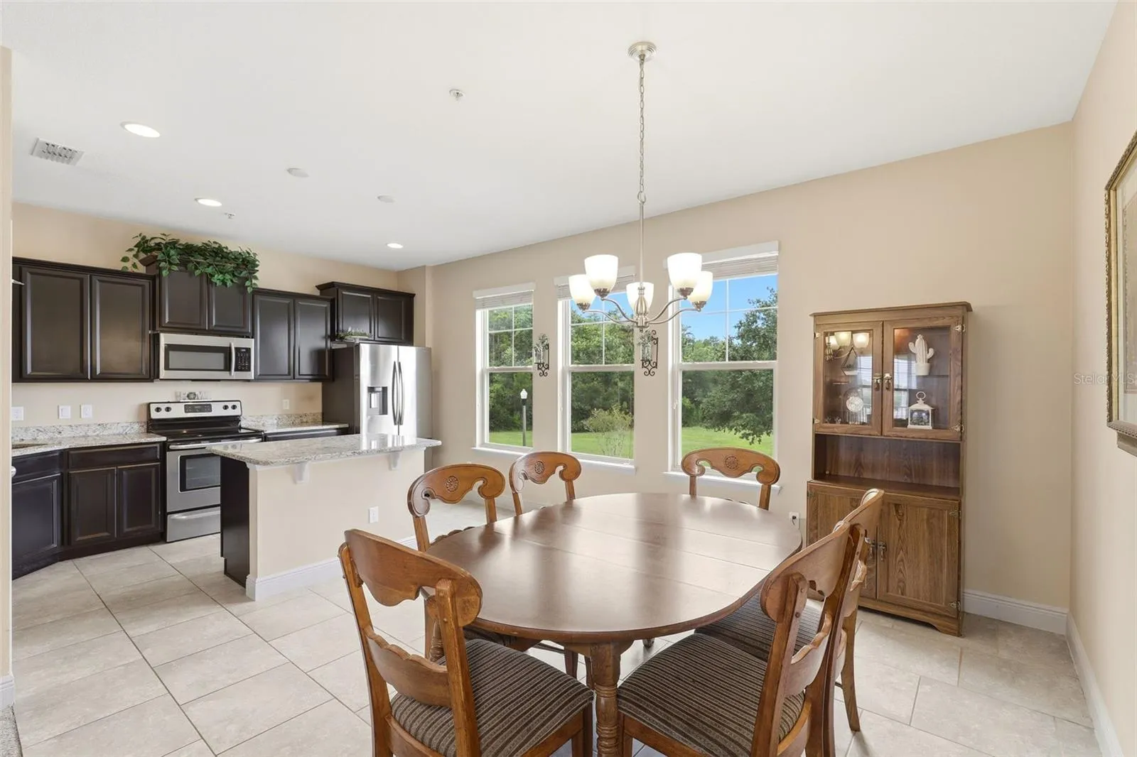 Dining area with southwest facing windows overlooking the pond