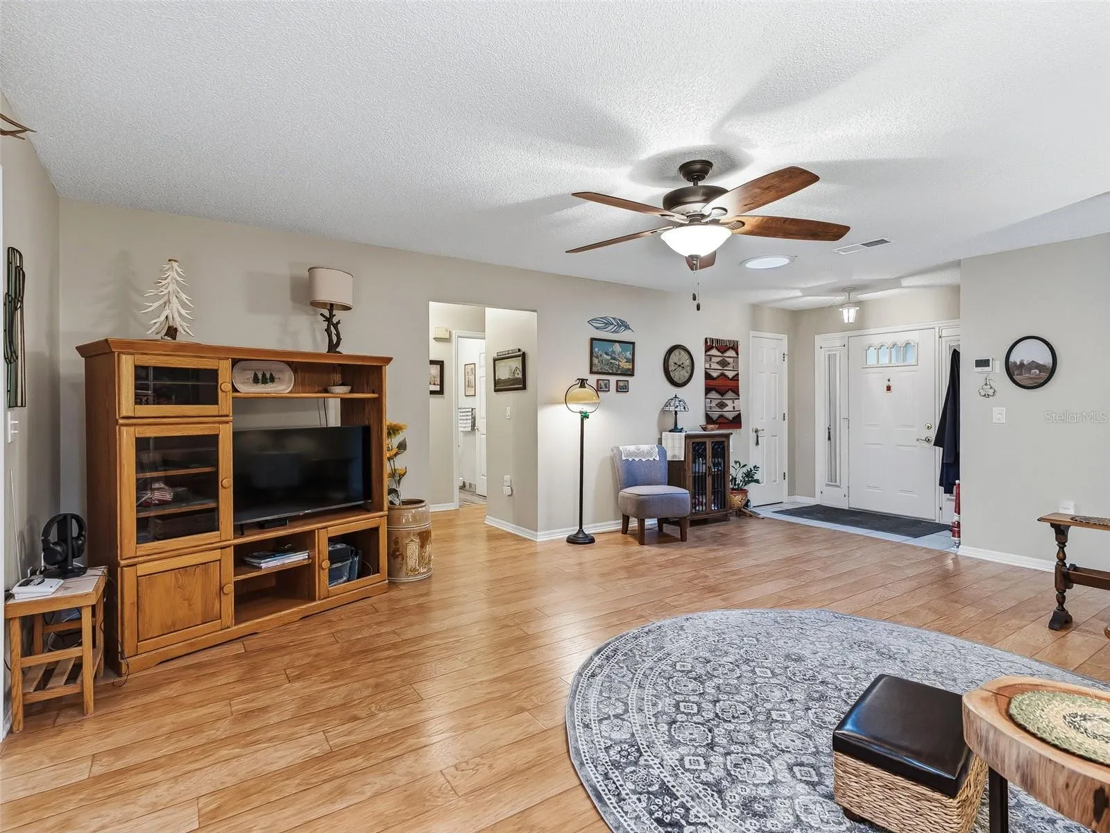 VIEW TOWARDS FOYER WITH COAT CLOSET