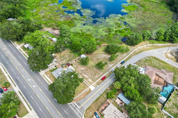 AERIAL VIEW OF HOME WITH 2 ADDTL LOTS AND VIEW OF LAKE HOLLYWOOD