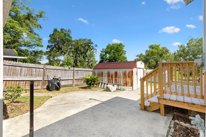 WOOD DECK AND STORAGE SHED