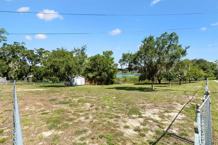 SIDE OF PROPERTY WITH 2ND LARGE SHED