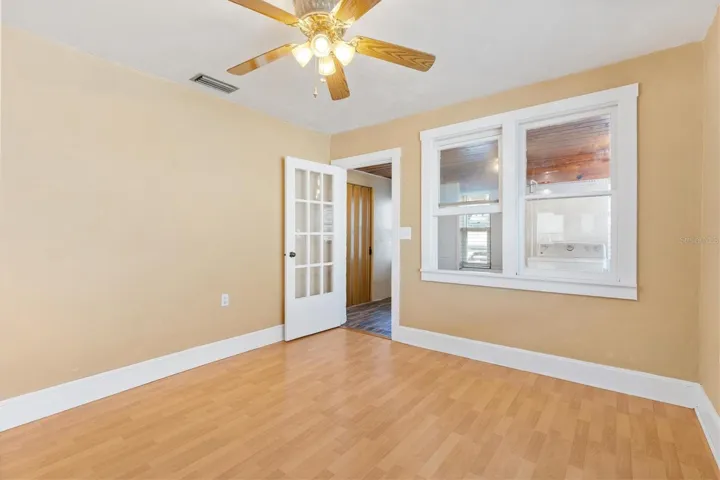 LIVING ROOM GOING TOWARDS LAUNDRY AREA