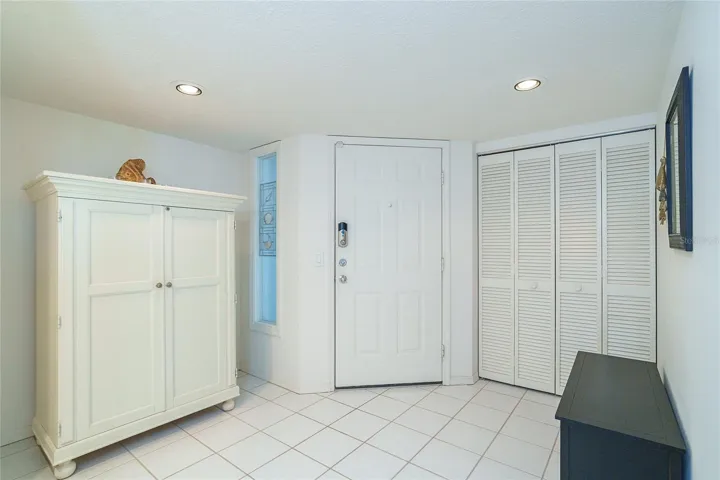 Foyer w/closet & armoire