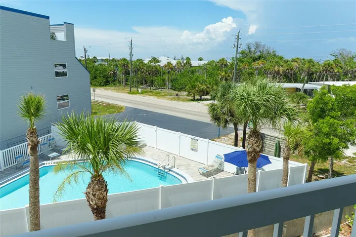 Balcony view of neighboring pool
