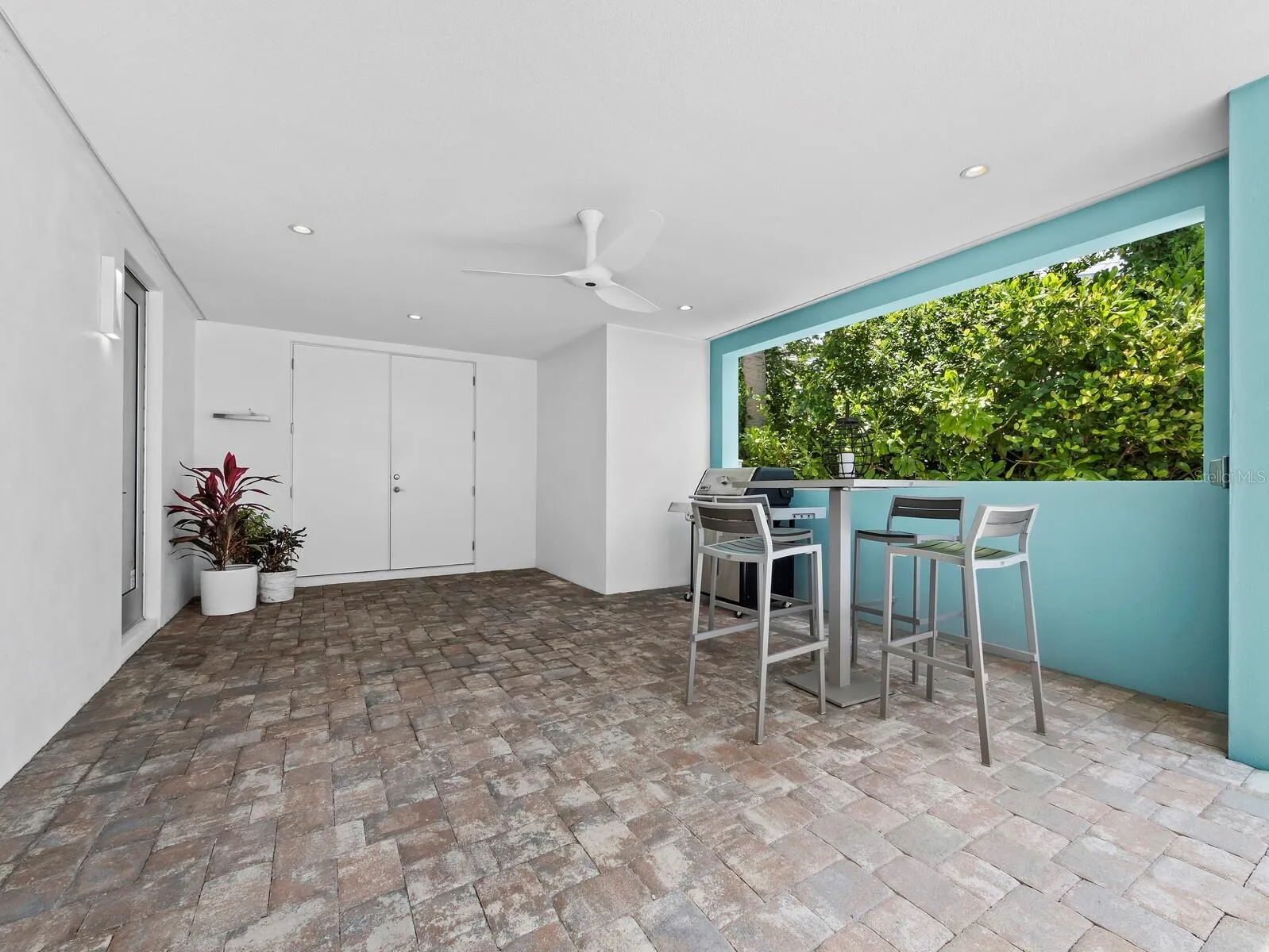 Poolside covered dining and grilling area