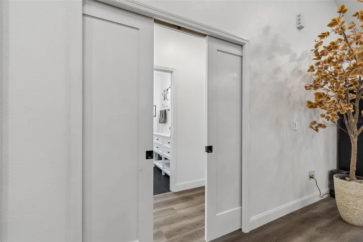 Pocket doors to bedroom 2&3 and bathroom