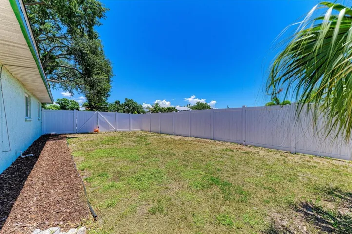 Both side yard areas are fenced