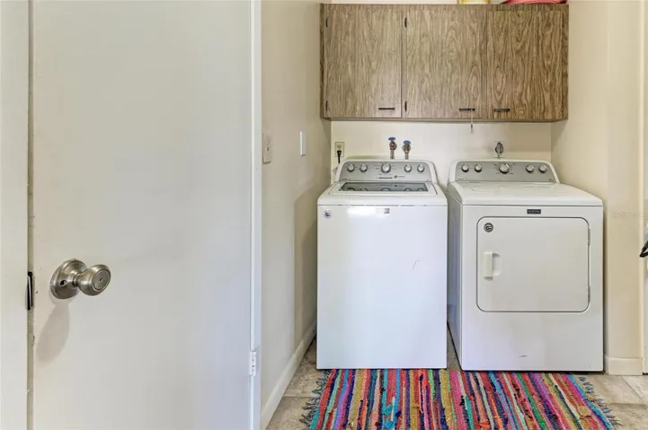Inside laundry and air conditioned storage room