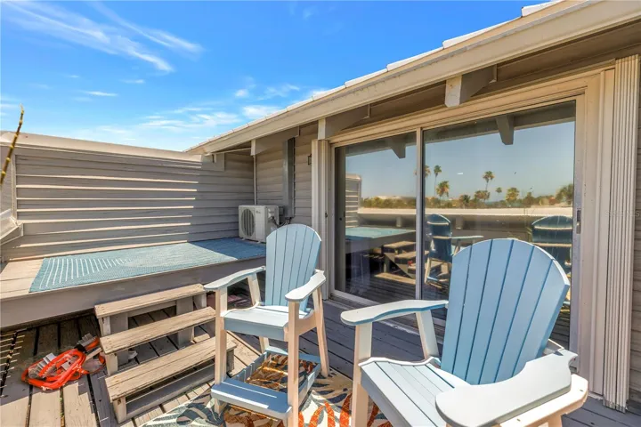 Primary bedrooms balcony with extra deck