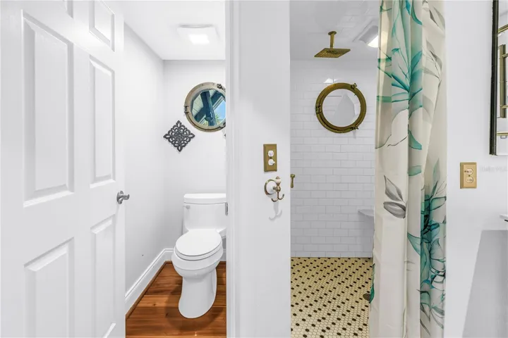 Port hole in bath w/ waterviews