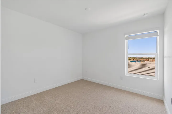 Bedroom-Photo description represents the model home of same floor plan.