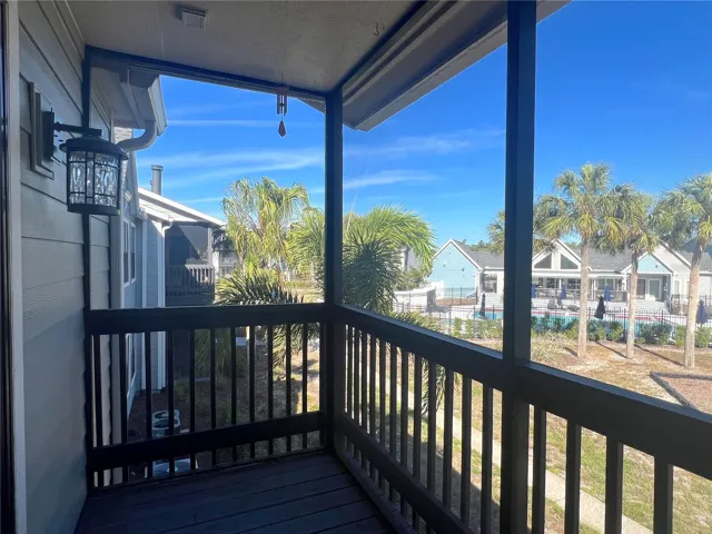 Screened Patio with view of Community Pool