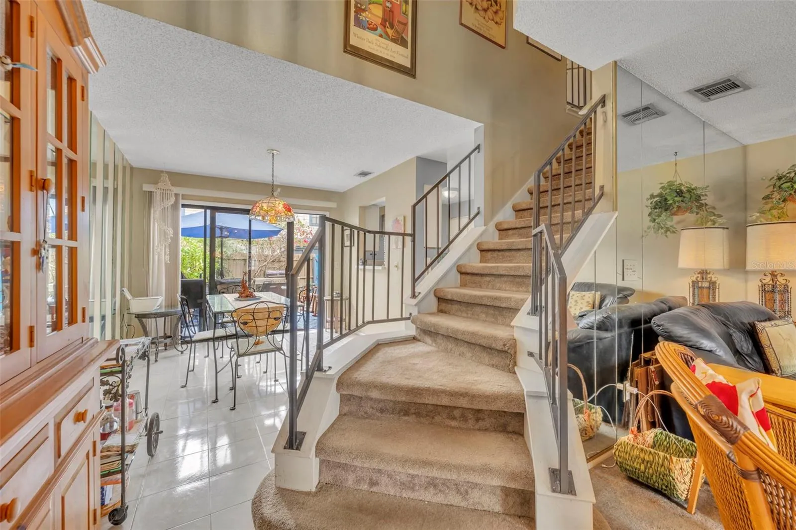 Staircase divide the Living and Dining Rooms