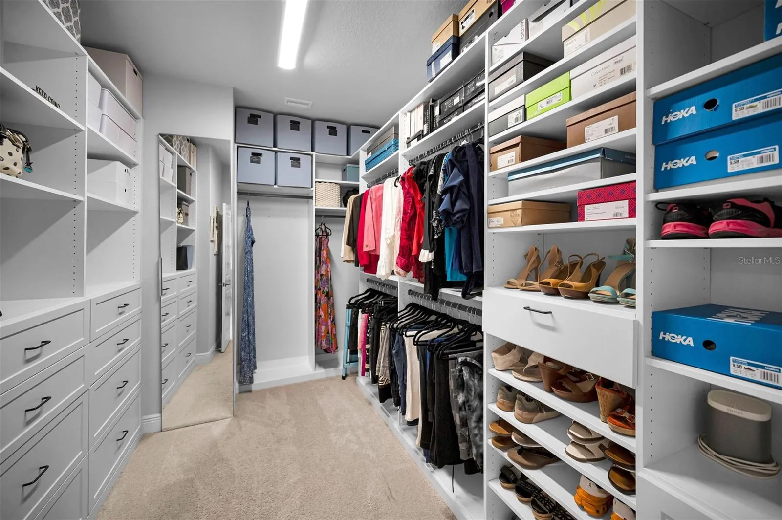 Large primary bedroom custom walk in closet