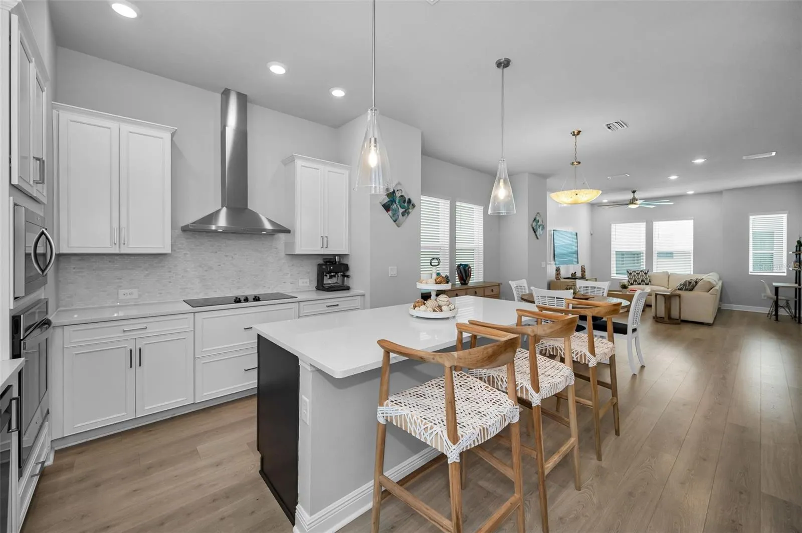 Kitchen with Island and open floor plan to living area