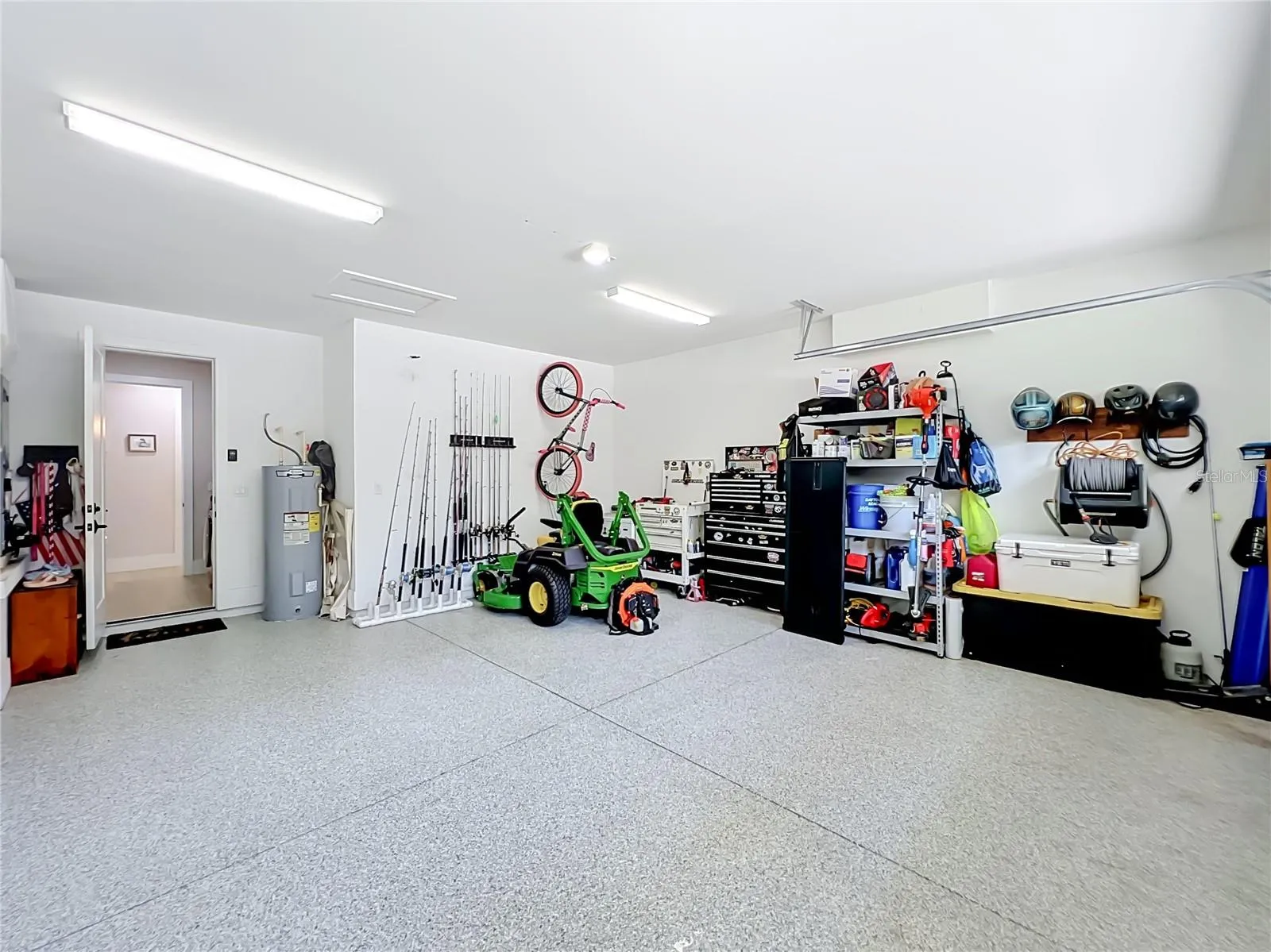 Garage with epoxy flooring.