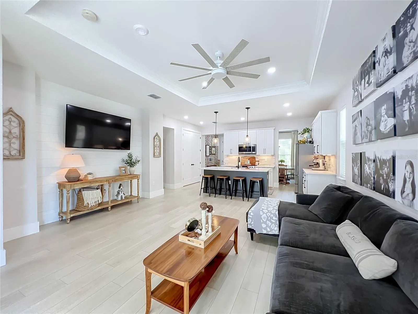 Accent wall in Living Room has shiplap.