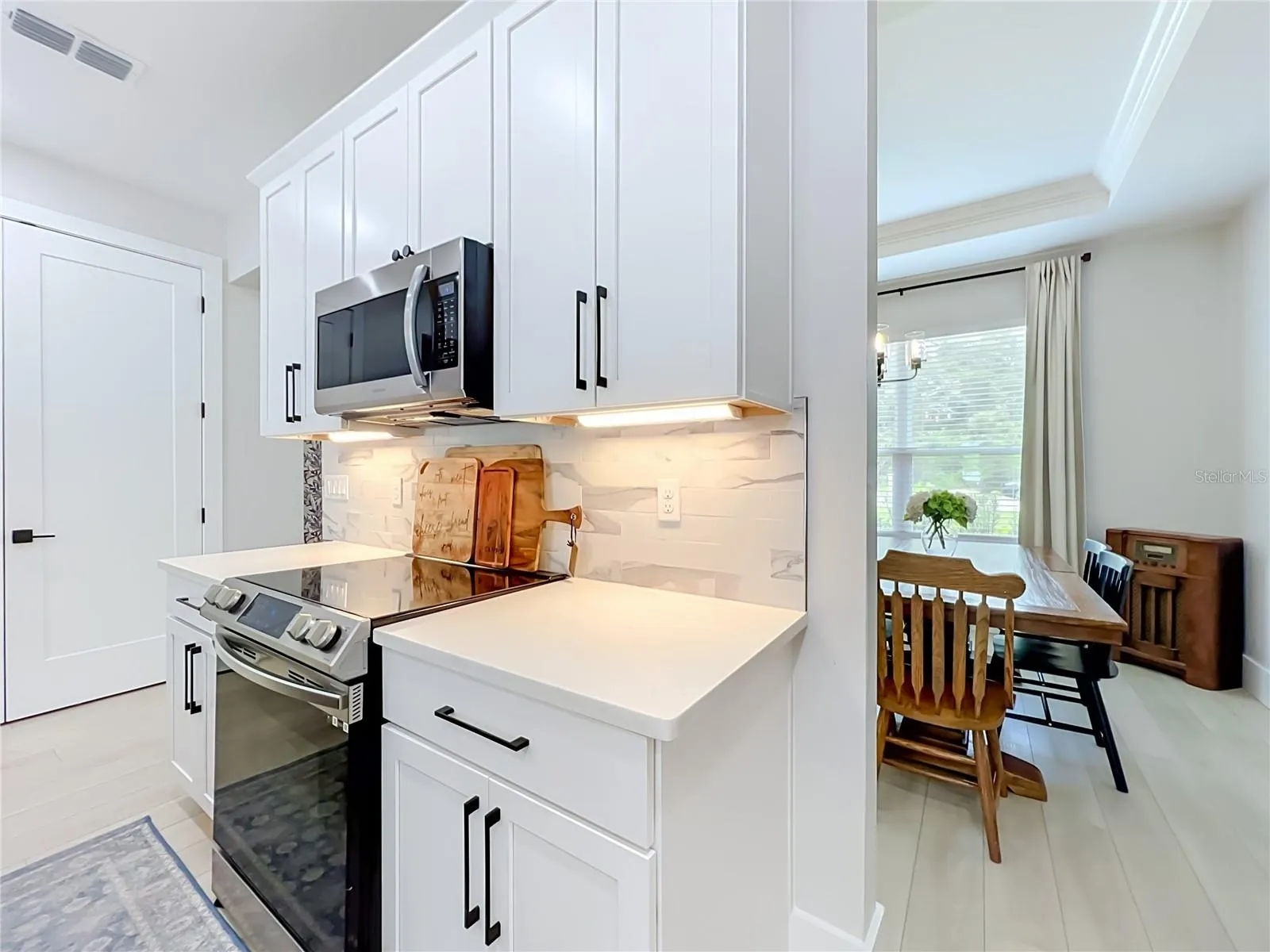 Designated Dining Room off the Kitchen or could be used as an office.