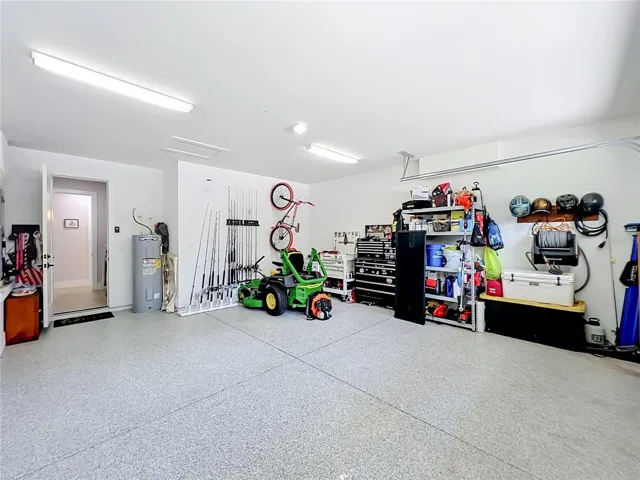 Garage with epoxy flooring.