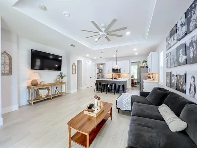 Accent wall in Living Room has shiplap.