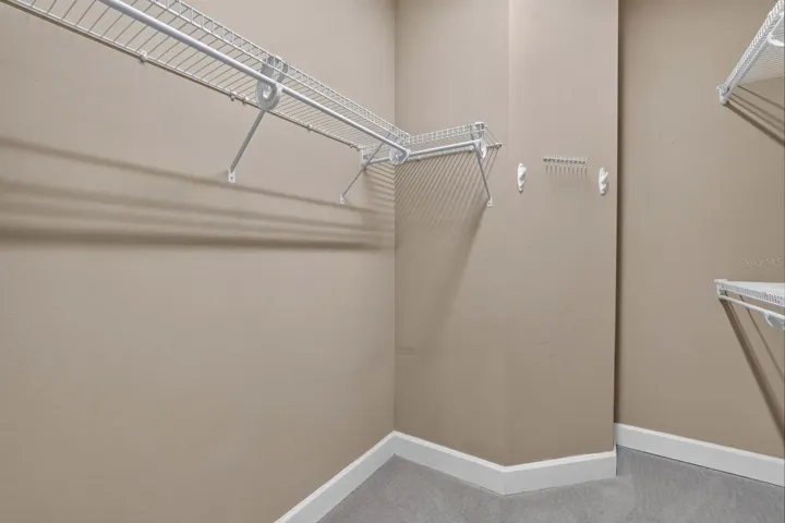Spacious walk in primary closet