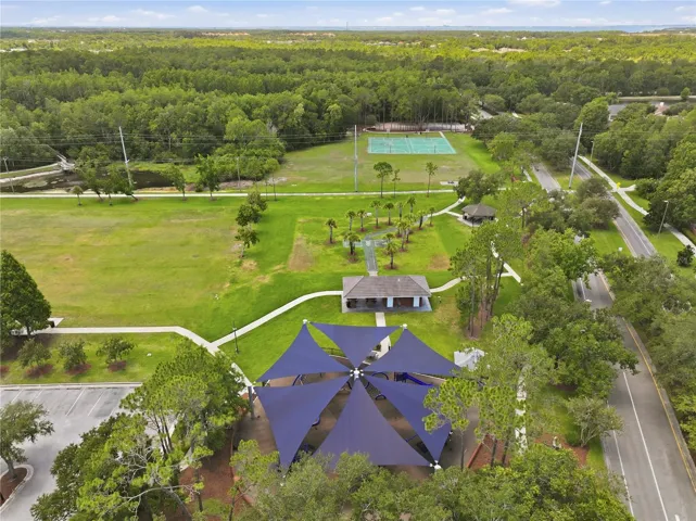 Glencliff Park, basketball court, activity area and trails off to the right in the wooded area. Located off Countryway Blvd.