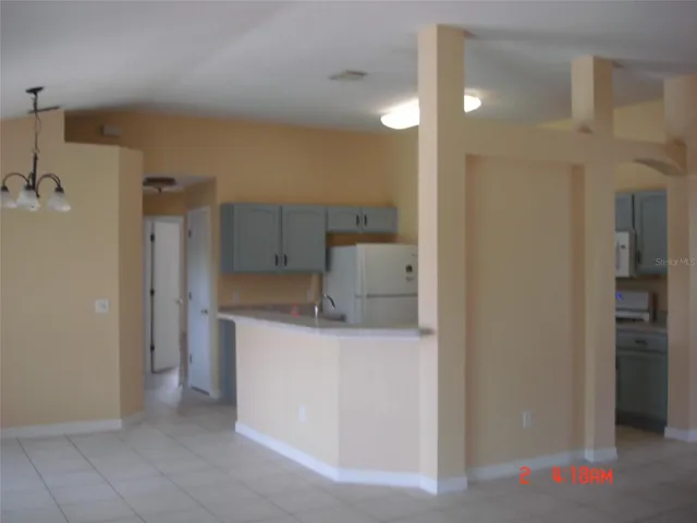 Kitchen eating area looking into kitchen