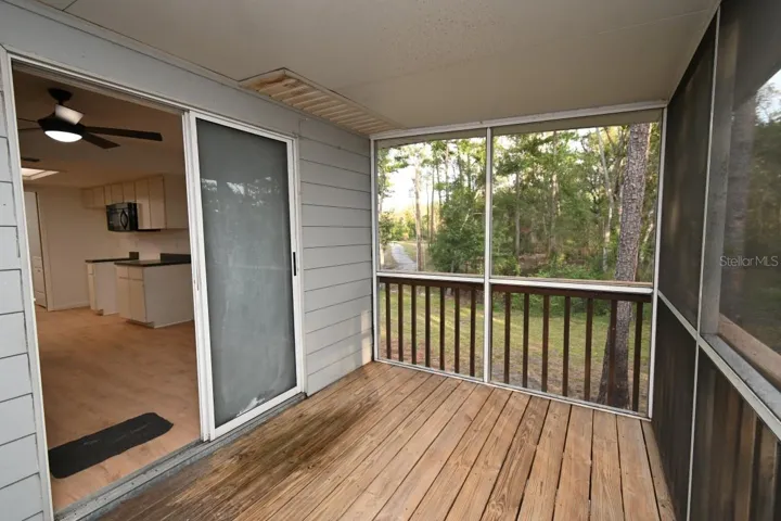 SCREENED LANAI OFF KITCHEN DINING AREA