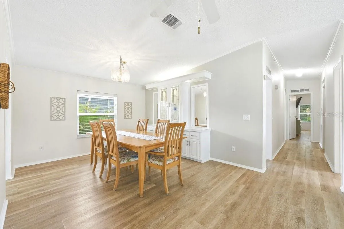 Dining Room with built in lighted cabinet