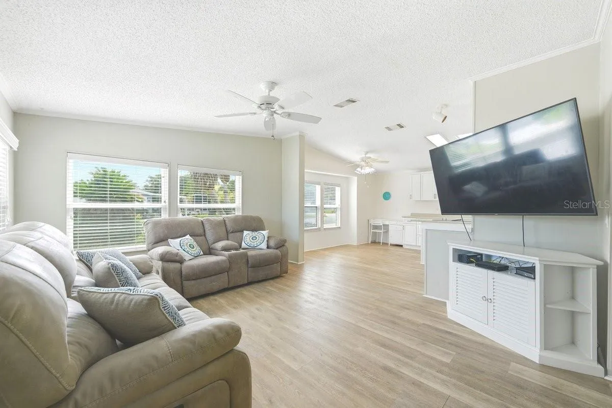 Family Room off the kitchen. Notice the Luxury Vinyl Flooring throughout the home