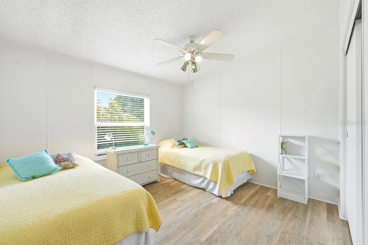Bedroom 2 with large closet, ceiling fan