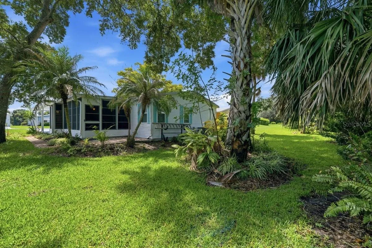 Backyard of property; no direct rear neighbors. Notice the Florida Room on back.