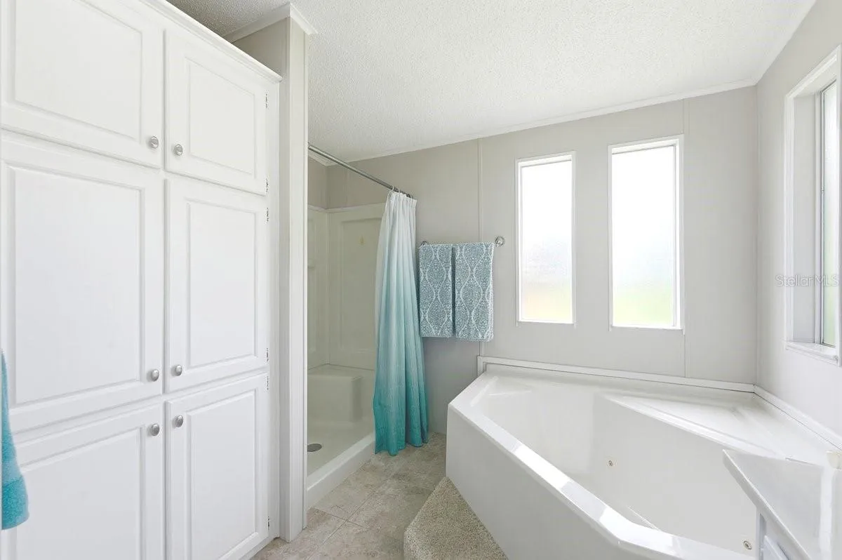 Garden Jet Tub with Separate Shower. Large Built in Linen Closet