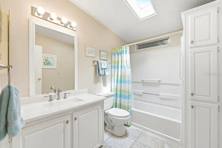 Hall Bath with Tub/Shower Combination. Built in Linen Closet. Upgraded Brushed Nickel Faucet.