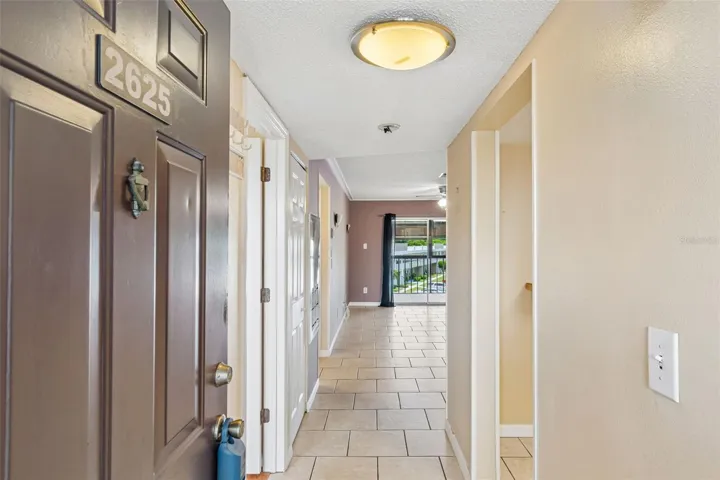 Entering the condo thru the front door.