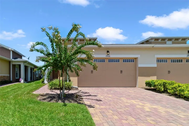 WHY WAIT TO BUILD when you can MOVE RIGHT IN to this beautifully upgraded 2022 BUILT home in the sought-after, GATED ~ 55+ COMMUNITY of Twin Lakes?