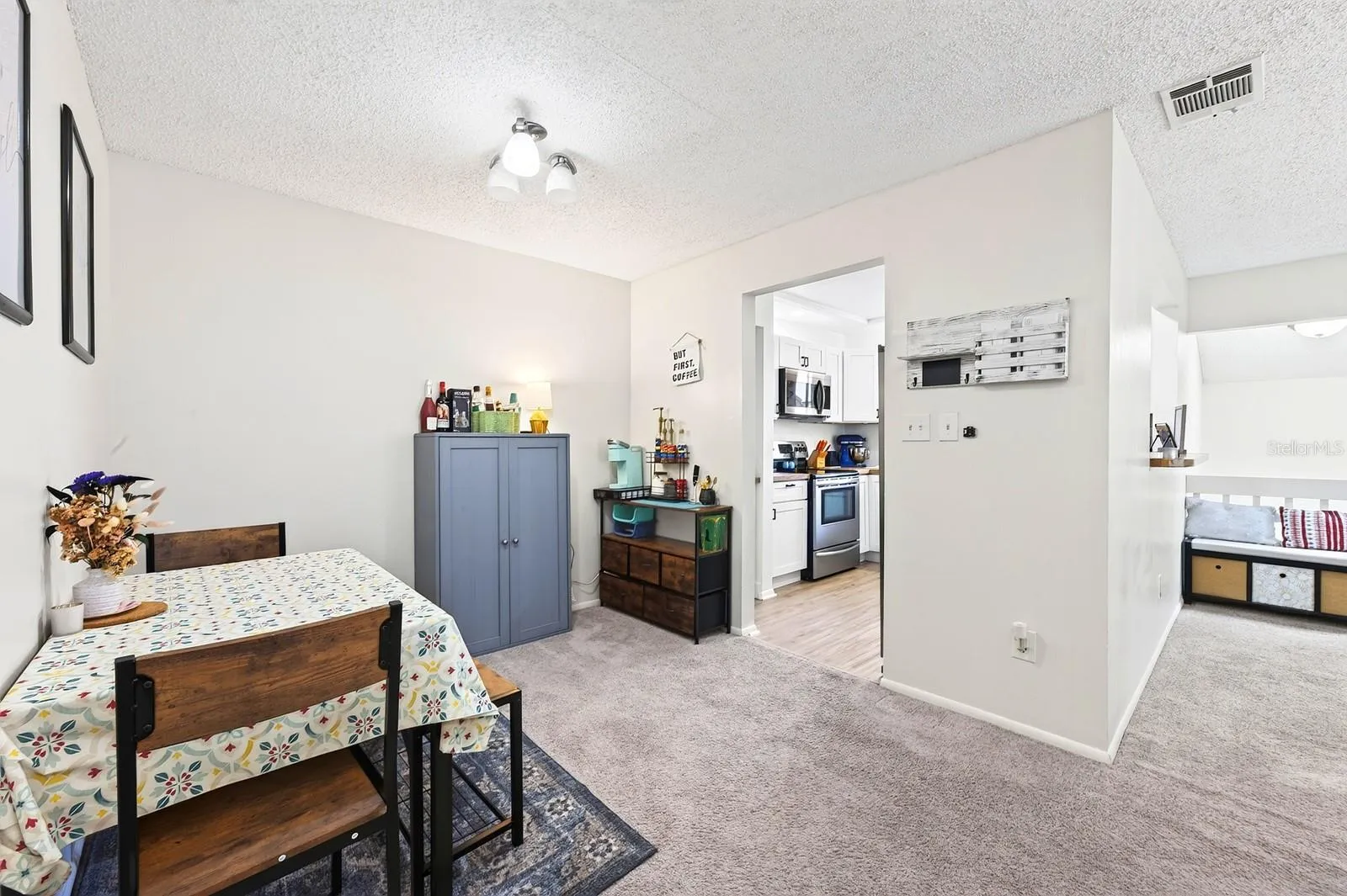 Dining area flows seamlessly into the kitchen from the living area.