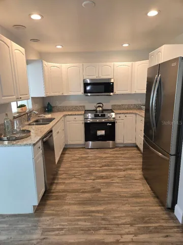 Kitchen with all new stainless steel appliances