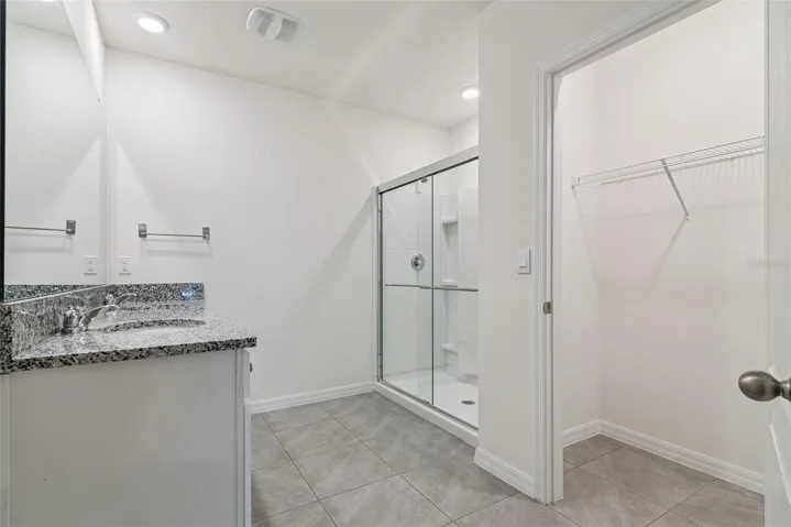 Primary Suite Bath w/ separate toilet.
