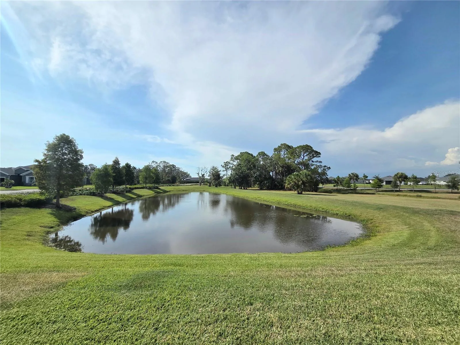 Adjacent to left side of property