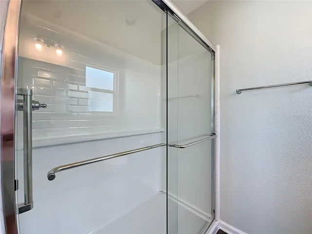 Primary Bathroom New Glass Shower Doors