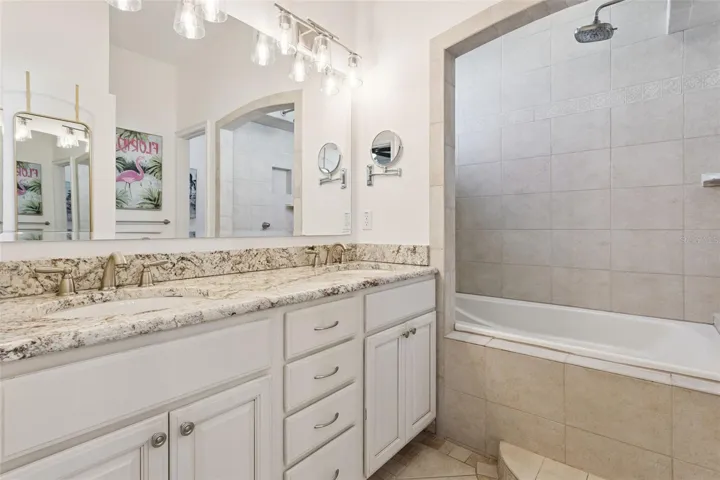 Primary Ensuite Bathroom with Garden Tub and shower and double sinks.