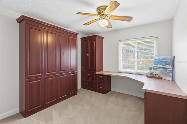Bedroom 3 used as an office with a Murphy Bed