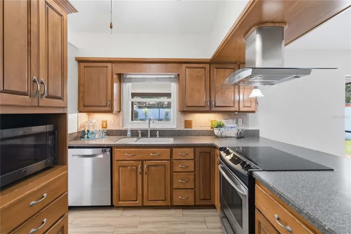Solid stone counters and stainless appliances
