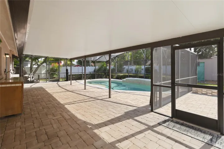 And a large covered lanae connected to the screened in pool