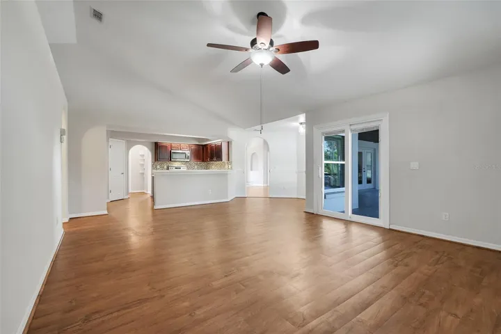 Kitchen/family room combo with sliders to enclosed lanai