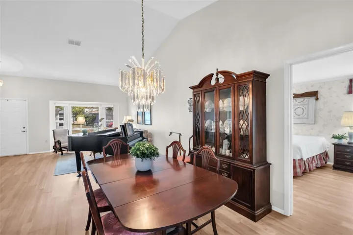 Spacious dining room perfectly tucked between the family room and kitchen~