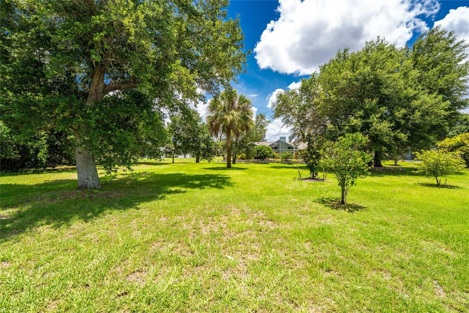 This is part of the 2-lot parcel - beautifully maintained property to the left of the home